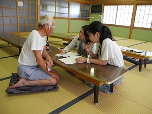 豊島甲生(こう)地区でのヒアリングの様子。