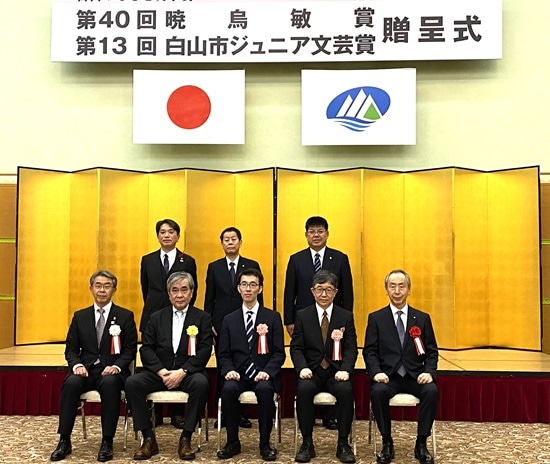 下段中央が田中さん