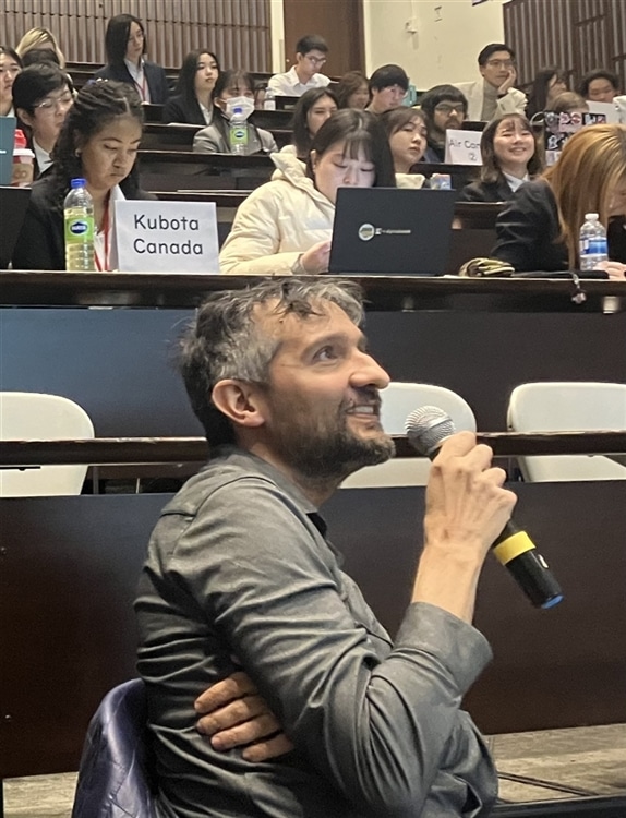 Mr. Khan giving feedback to students